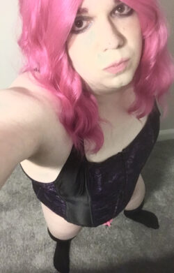 Sissy Donna in corset, stockings and chastity