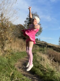 Sissy Annabel outdoors as a cheerleader